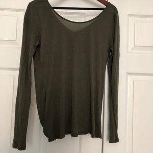 Very unique shirt that cross-crosses in the.back.